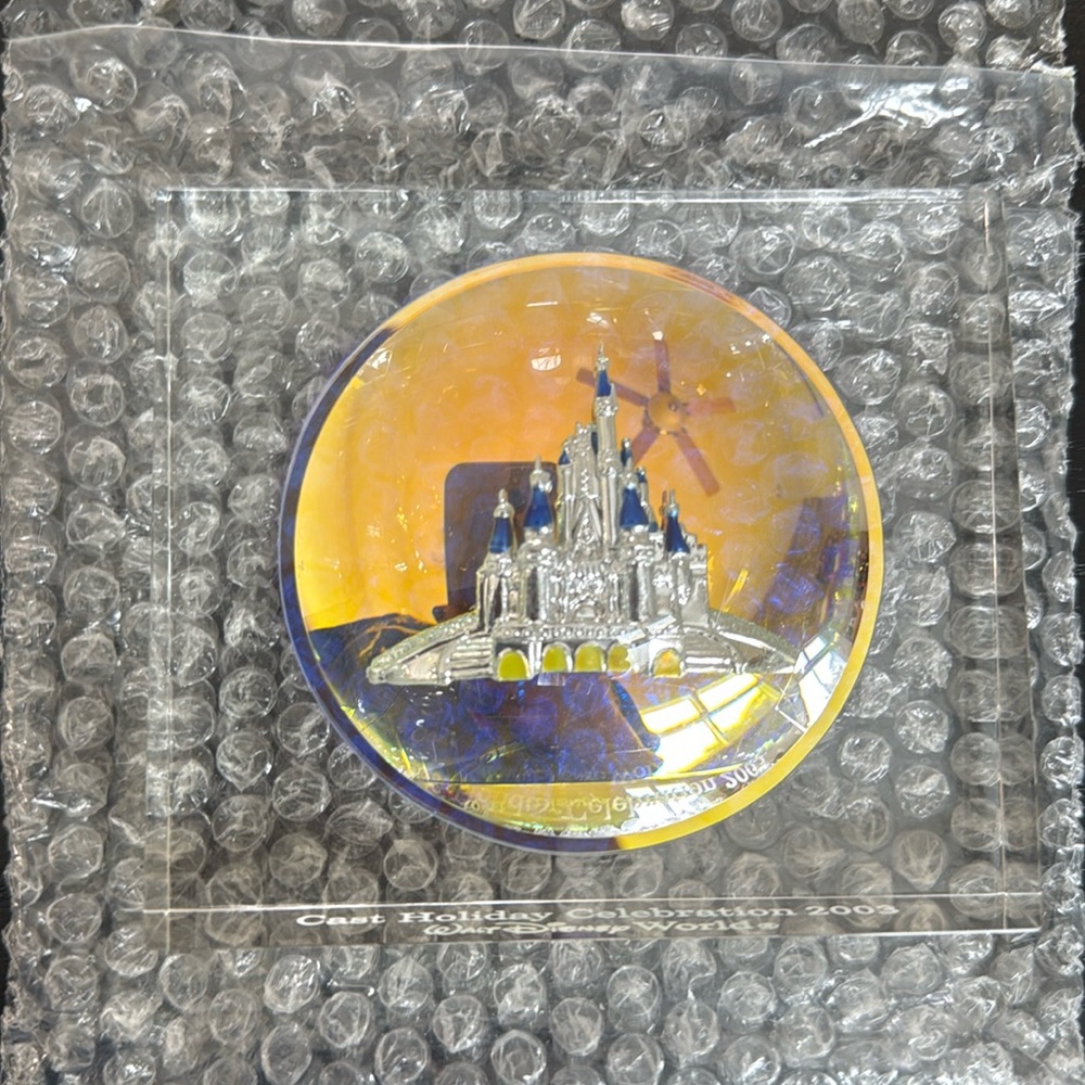Collectible Magic Kingdom paper weight. 2003 limited piece.